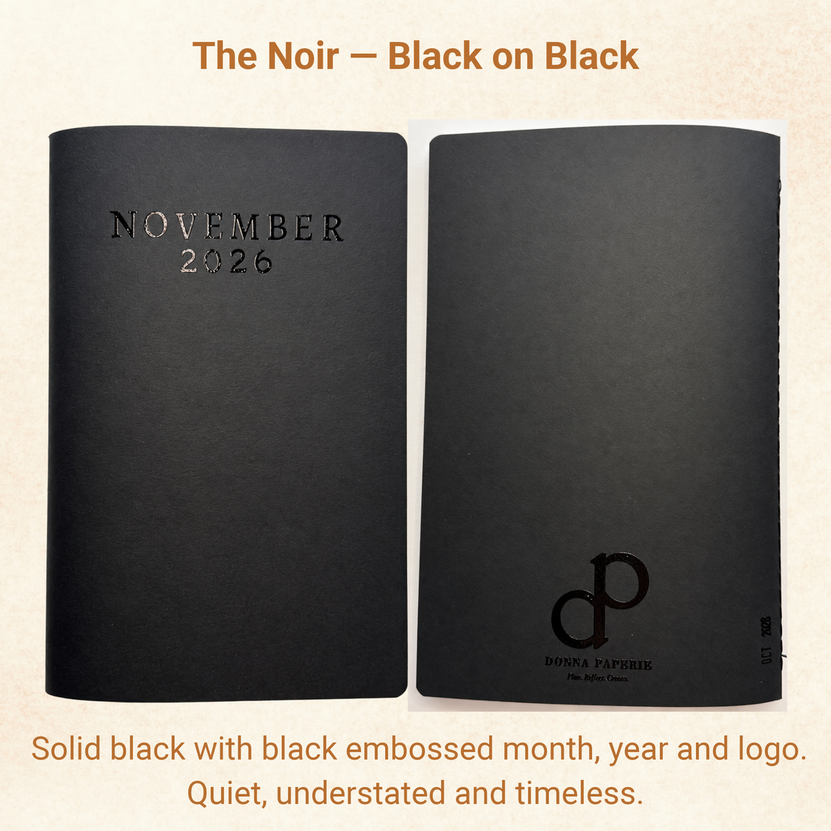 The Noir planner cover, solid black with black embossed November 2026 and Donna Paperie logo on the back